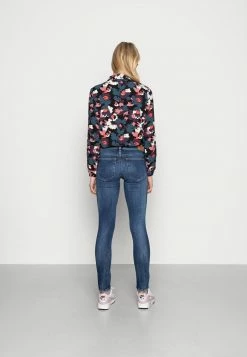 Diesel SLANDY-LOW - Jeans Skinny Fit - Dark Blue -Diesel shop 081ad812f1ca4e8189f035251fb4b1d7