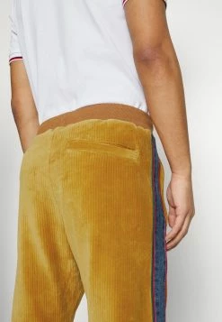 Diesel MEYERLY - Trousers - Orange -Diesel shop 36fde6231a96444680b4501b831ccf42