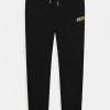 Diesel PHORY UNISEX - Tracksuit Bottoms - Black Bright Yellow