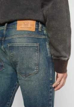 2021 DIESEL LIBRARY - Bootcut Jeans - Dark Blue Denim -Diesel shop 82b41b27e61643f5b9763b7eedada0ff